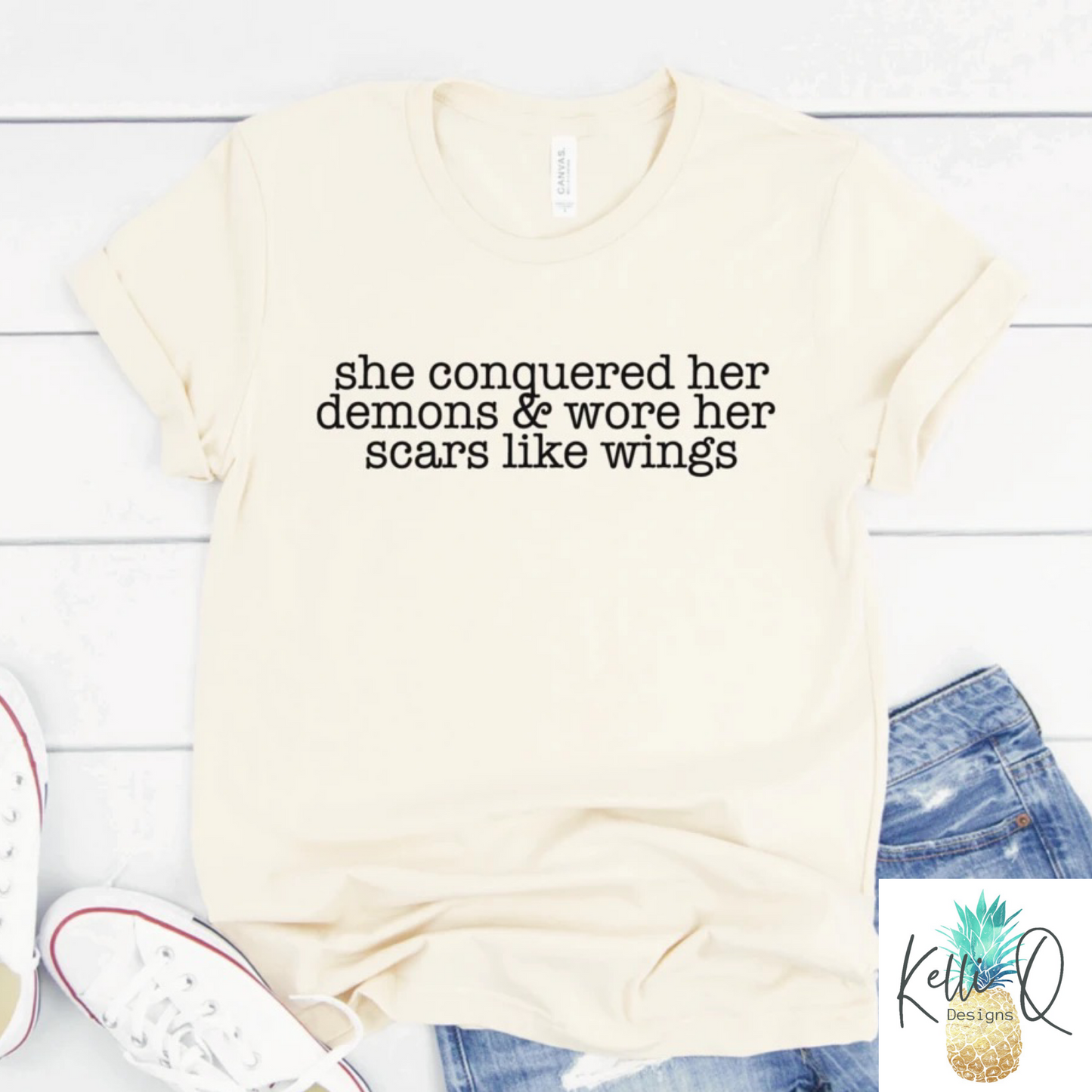 She conquered her demons & wore her scars like wings